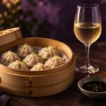 Steamed dumplings with a glass of pinot gris
